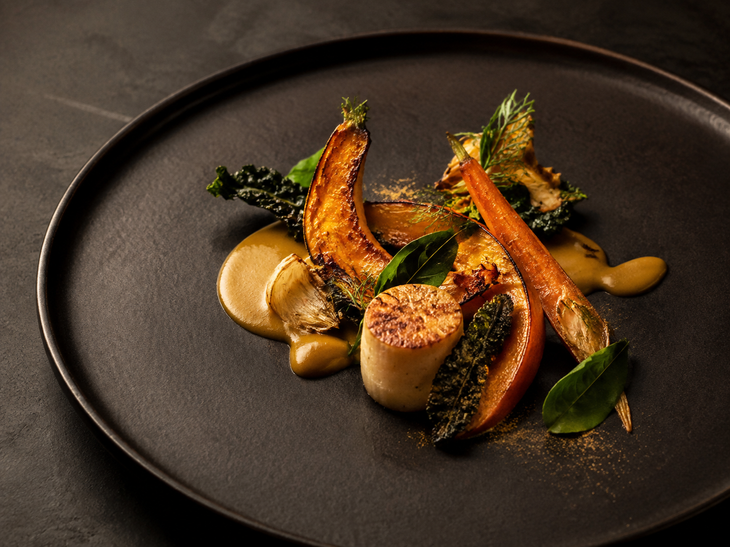 Fictional contemporary vegetable dish plated on dark ceramic
